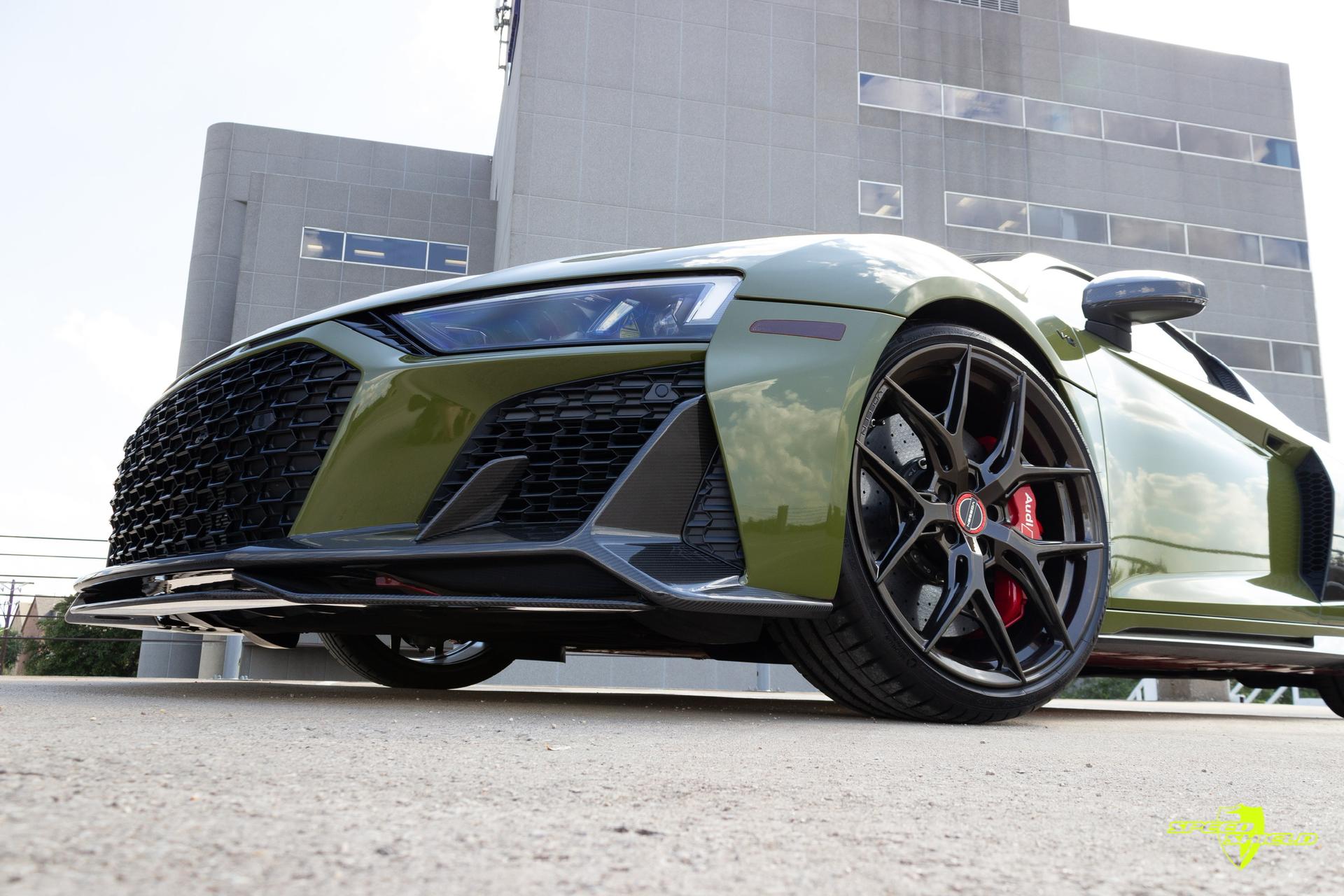 Front angle of a green Audi sports car, highlighting its sporty look and the protective PPF installed by Speed Shield USA.