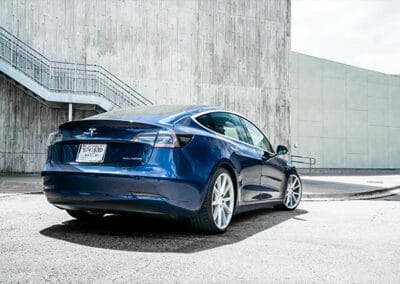 Blue and Yellow Clean Tesla Model 3