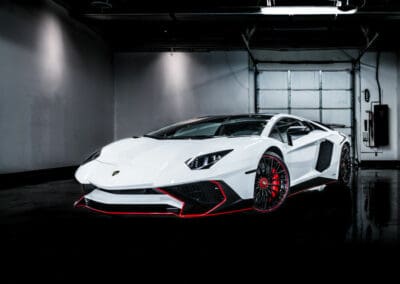 white and red Lamborghini Huracan