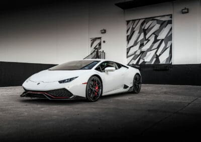 white and red Lamborghini Huracan